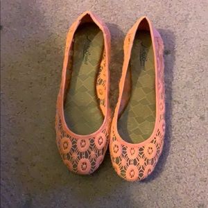 Orange lace flats